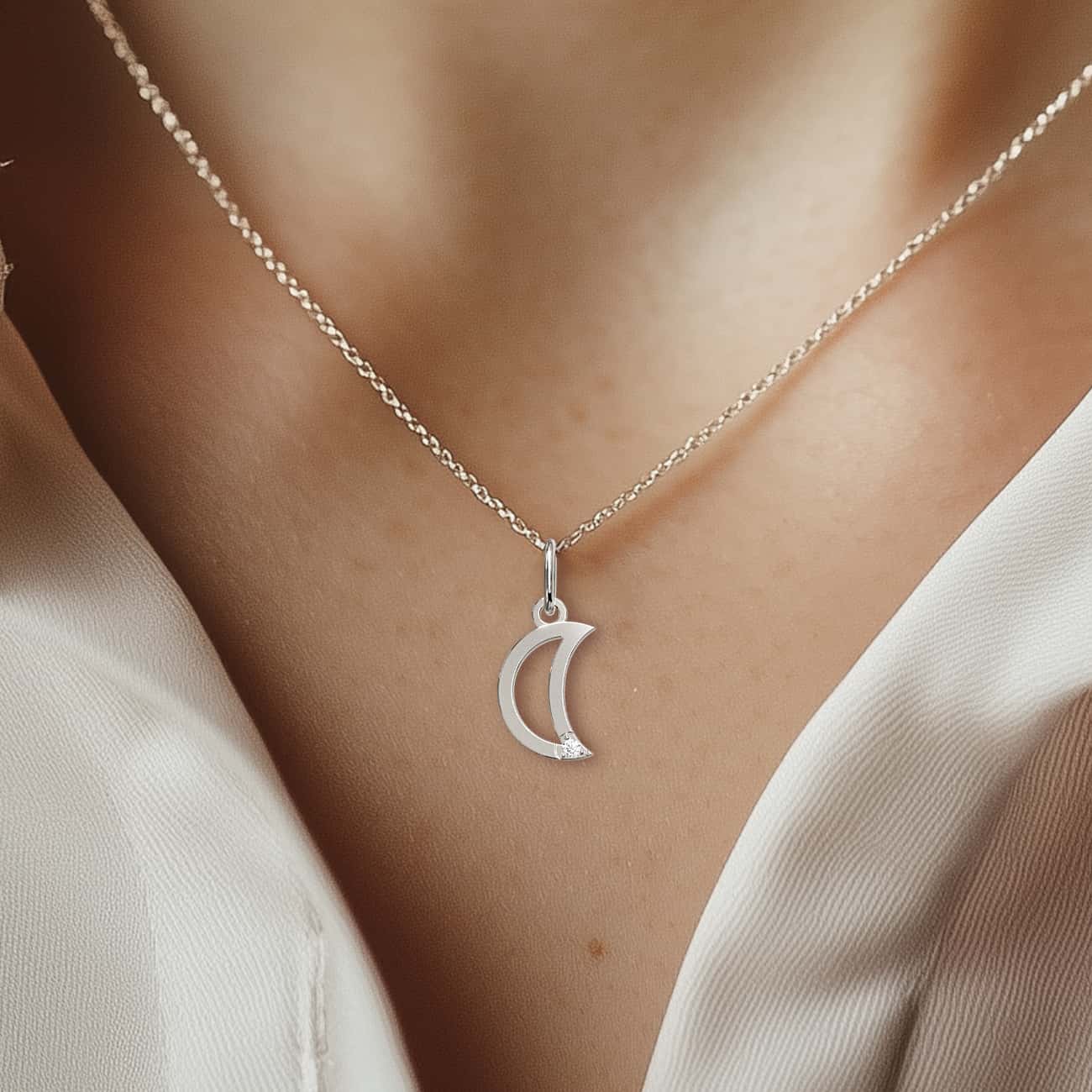 Delicate 14k gold moon pendant necklace with diamond