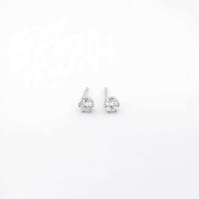 uhani z diamantom 2x 0.10 ct belo zlato od blizu