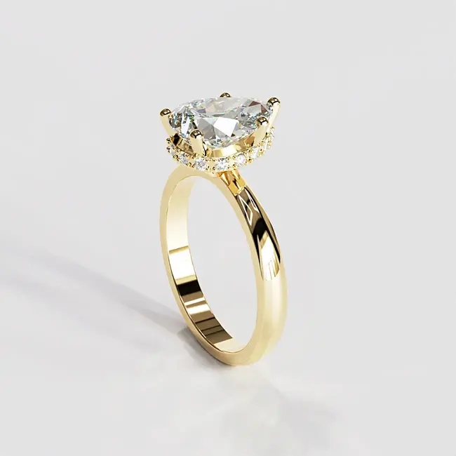 Verlobungsring aus Gelbgold mit birnenförmigem Diamanten und verstecktem Halo