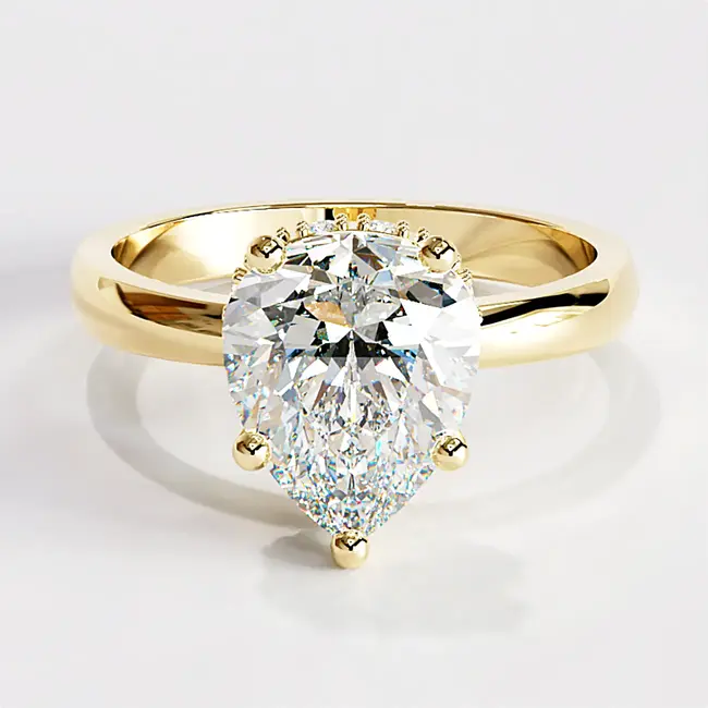 Verlobungsring aus Gelbgold mit birnenförmigem Diamanten im Solitär-Design