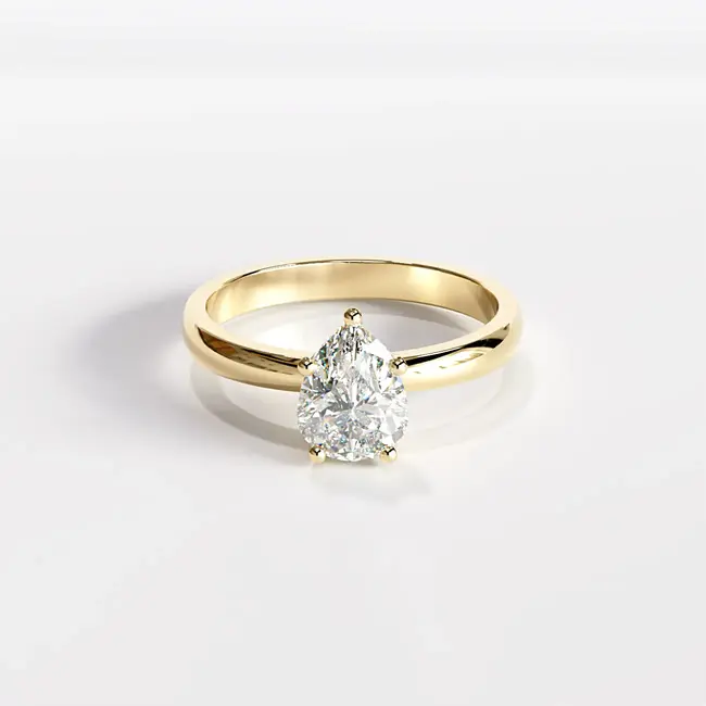 rumeno zlato hruskast diamant zaročni prstan