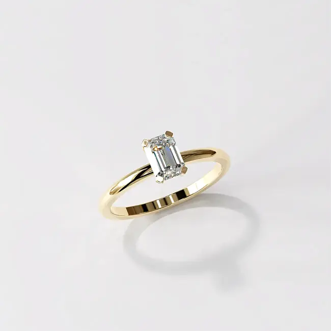 Verlovingsring met minimalistische smaragdgeslepen diamant van 0,5-0,6 karaat, geelgoud, massief goud.