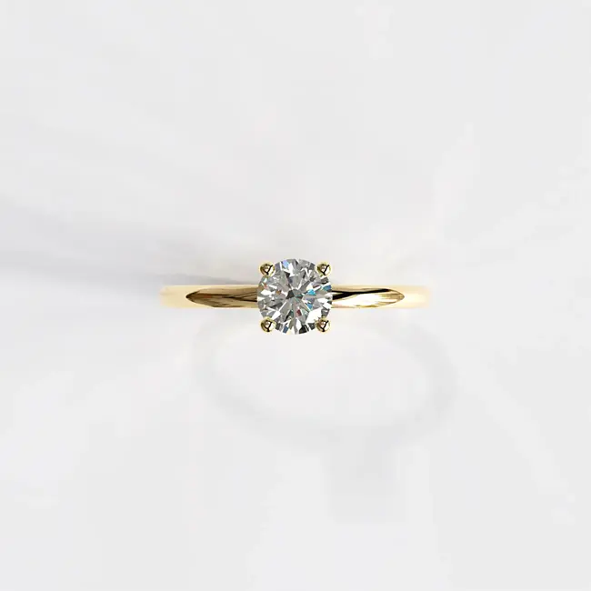 Verlovingsring met minimalistische ronde slijping van 0,5 ct laboratoriumdiamant, geelgouden uitvoering.