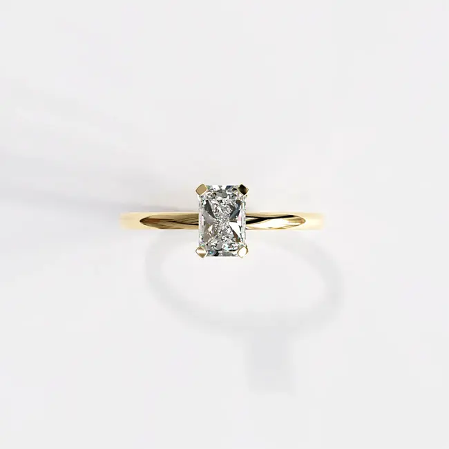 Verlovingsring met minimalistische radiant-slijping, 0,5-0,6 ct laboratoriumdiamant, geelgouden afwerking.