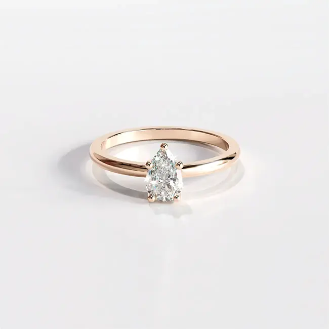 Verlovingsring met minimalistische peervormige slijping, 0,5-0,6 ct laboratoriumdiamant, witgouden zetting.