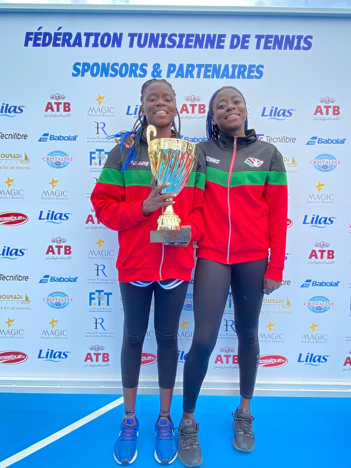 Okutoyi (left) poses with her sister Rose