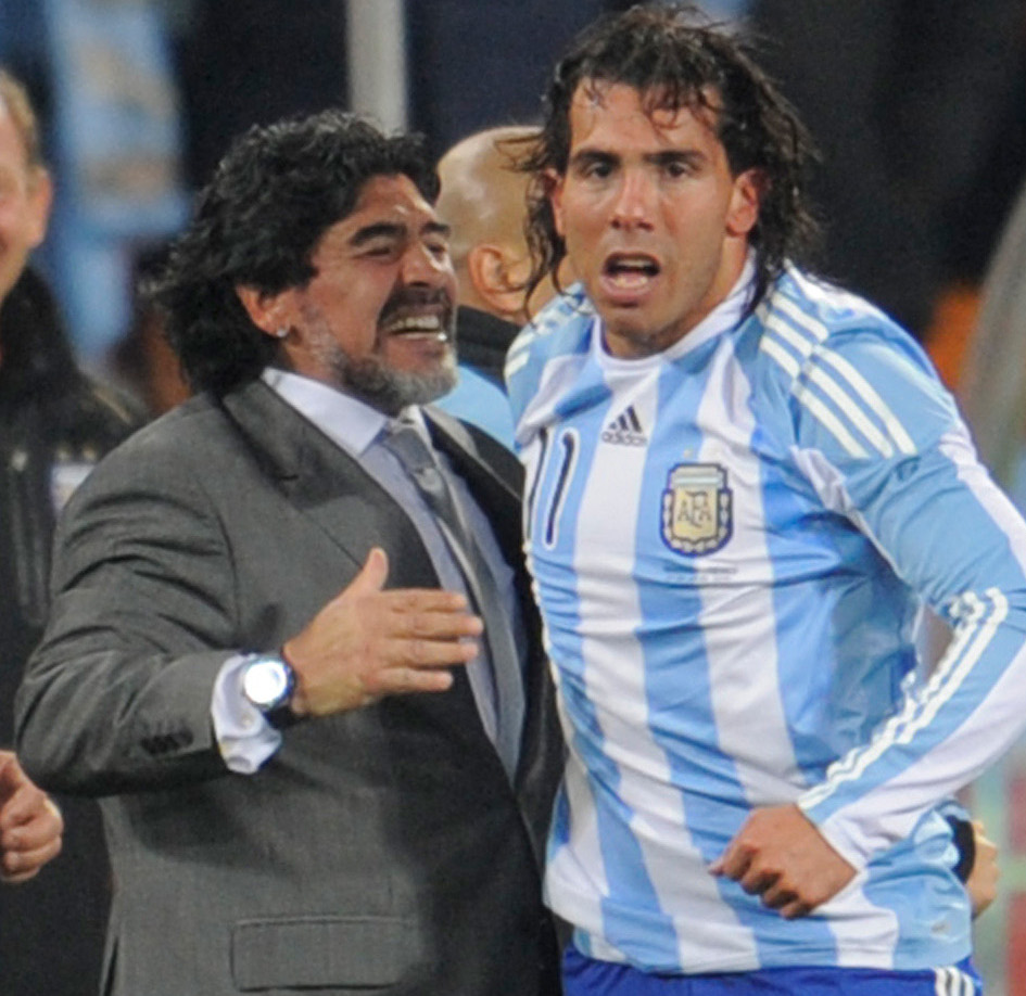 Huge loss: Diego Maradona with Tevez in 2010 (©AFP)