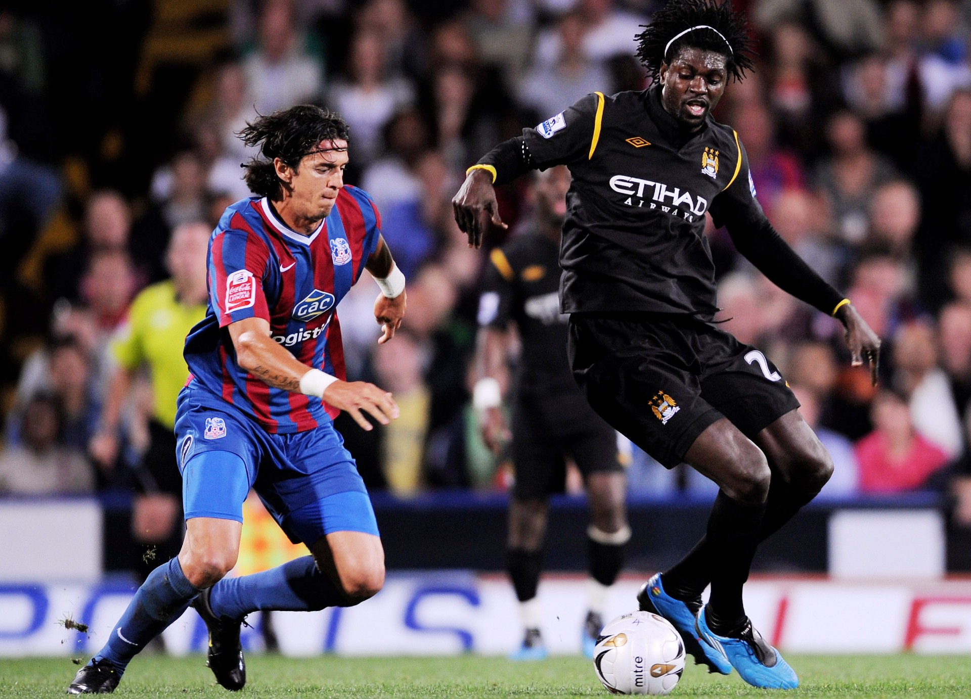 Fonte tackles Adebayor in 2009 (©Shaun Botterill/Getty Images)