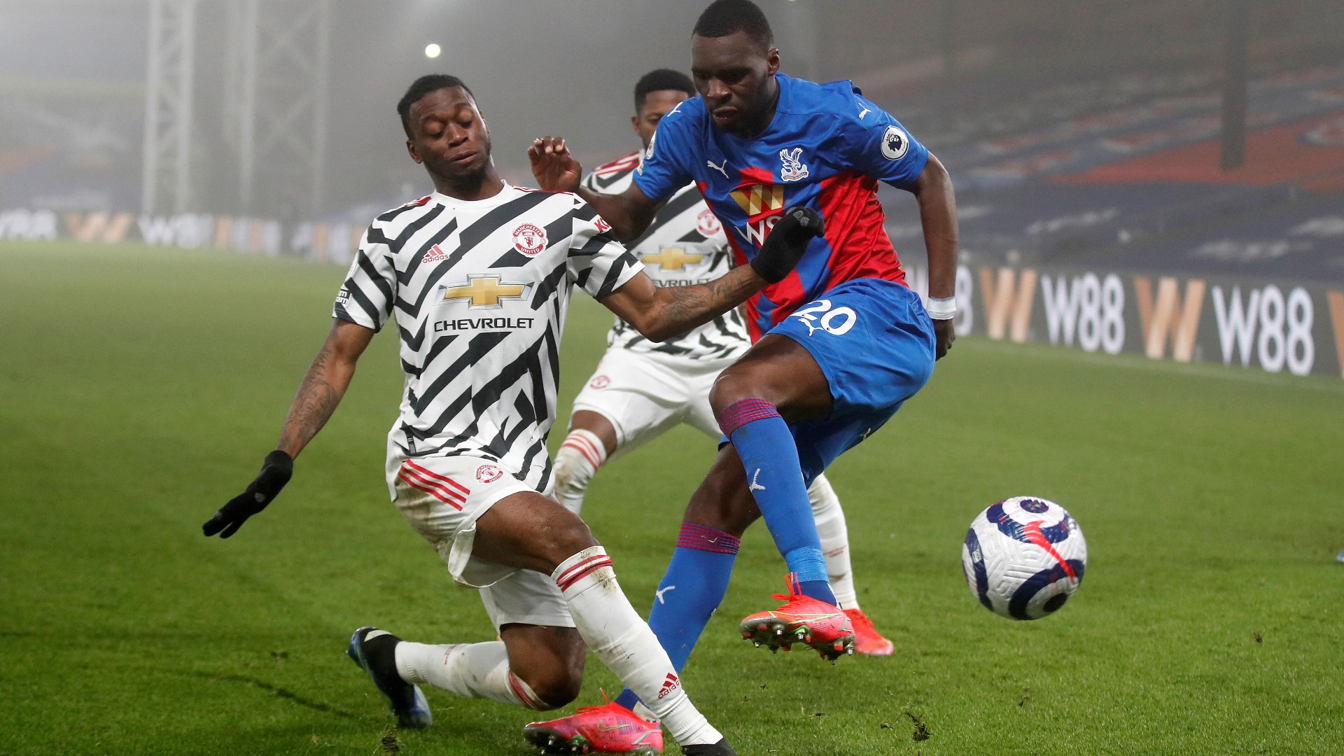 Benteke in action against Man Utd (©AFP)