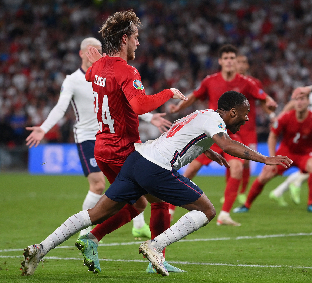 Raheem Sterling goes down in the box (©AFP)