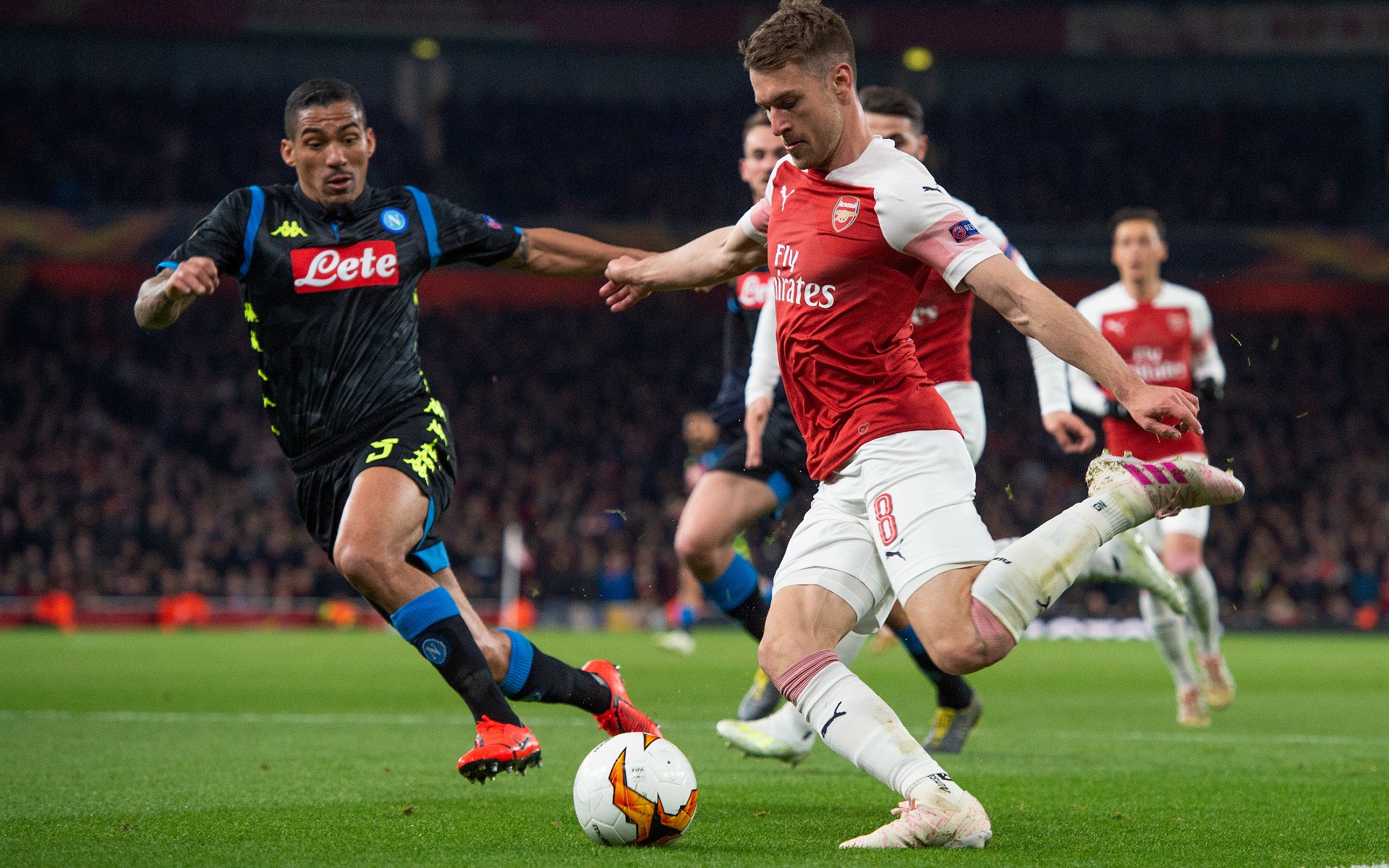 Ramsey in action for Arsenal against Napoli in April 2019 (©Visionhaus/Getty Images)