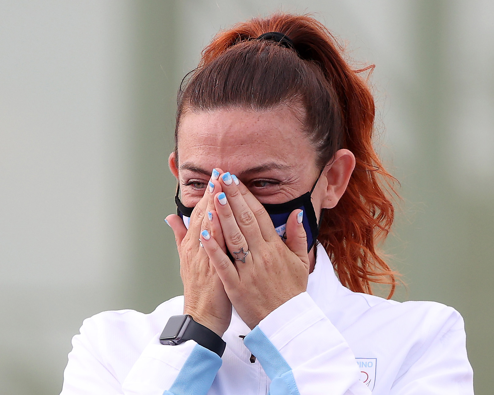Perilli cries after winning a bronze medal (©Kevin C. Cox/Getty Images)