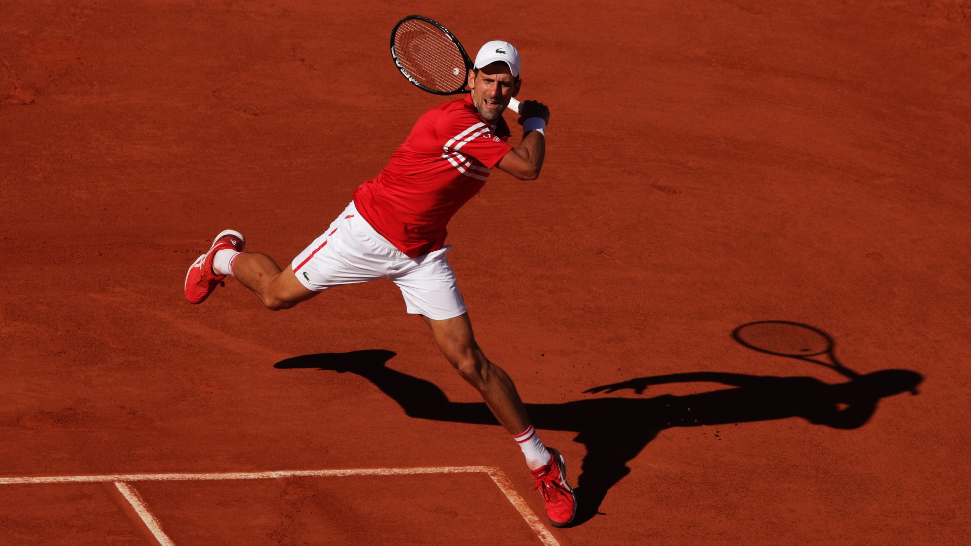 Djokovic in action (©Adam Pretty/Getty Images)