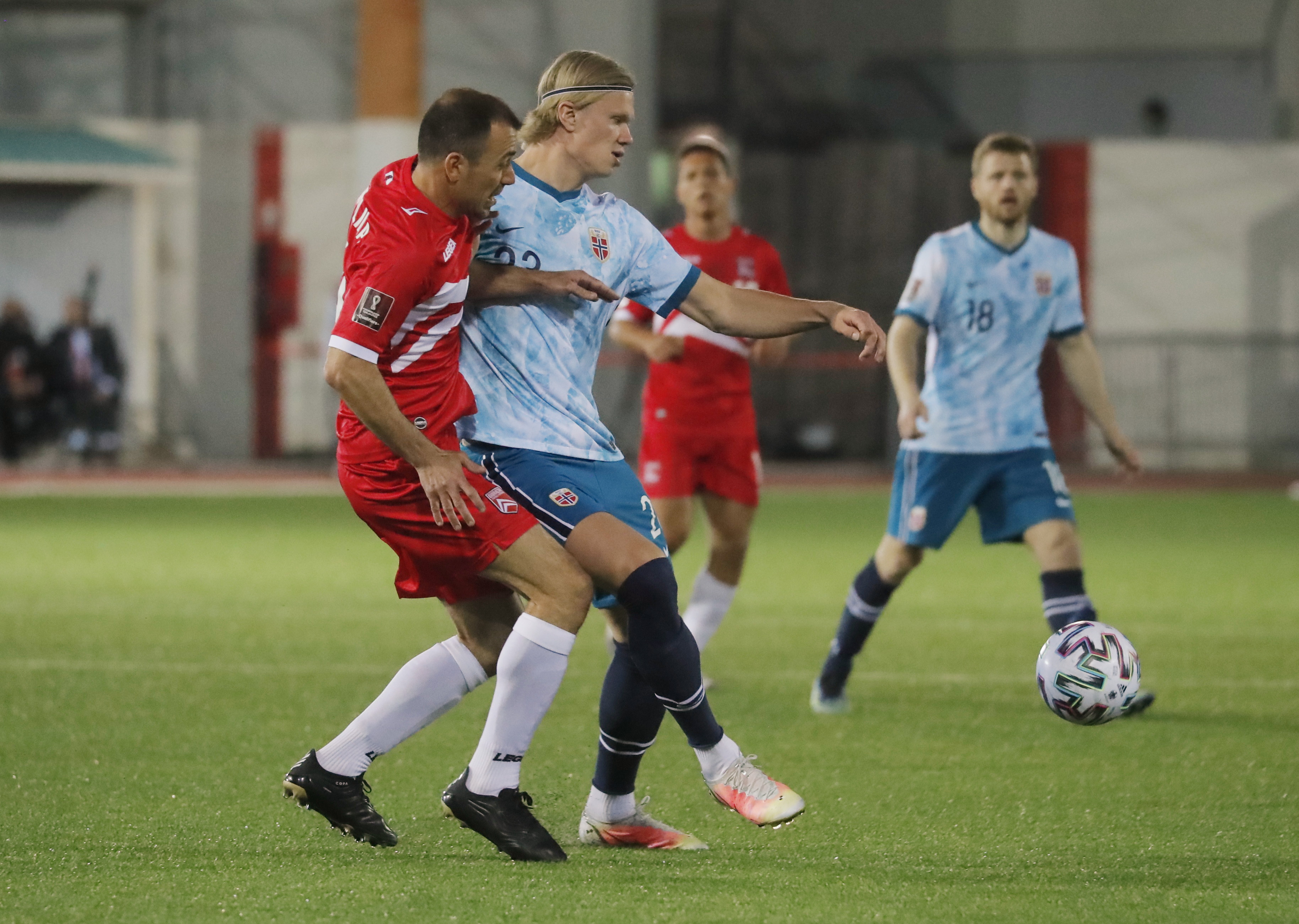 Chipolina and Haaland in action in March (© REUTERS/Jon Nazca)