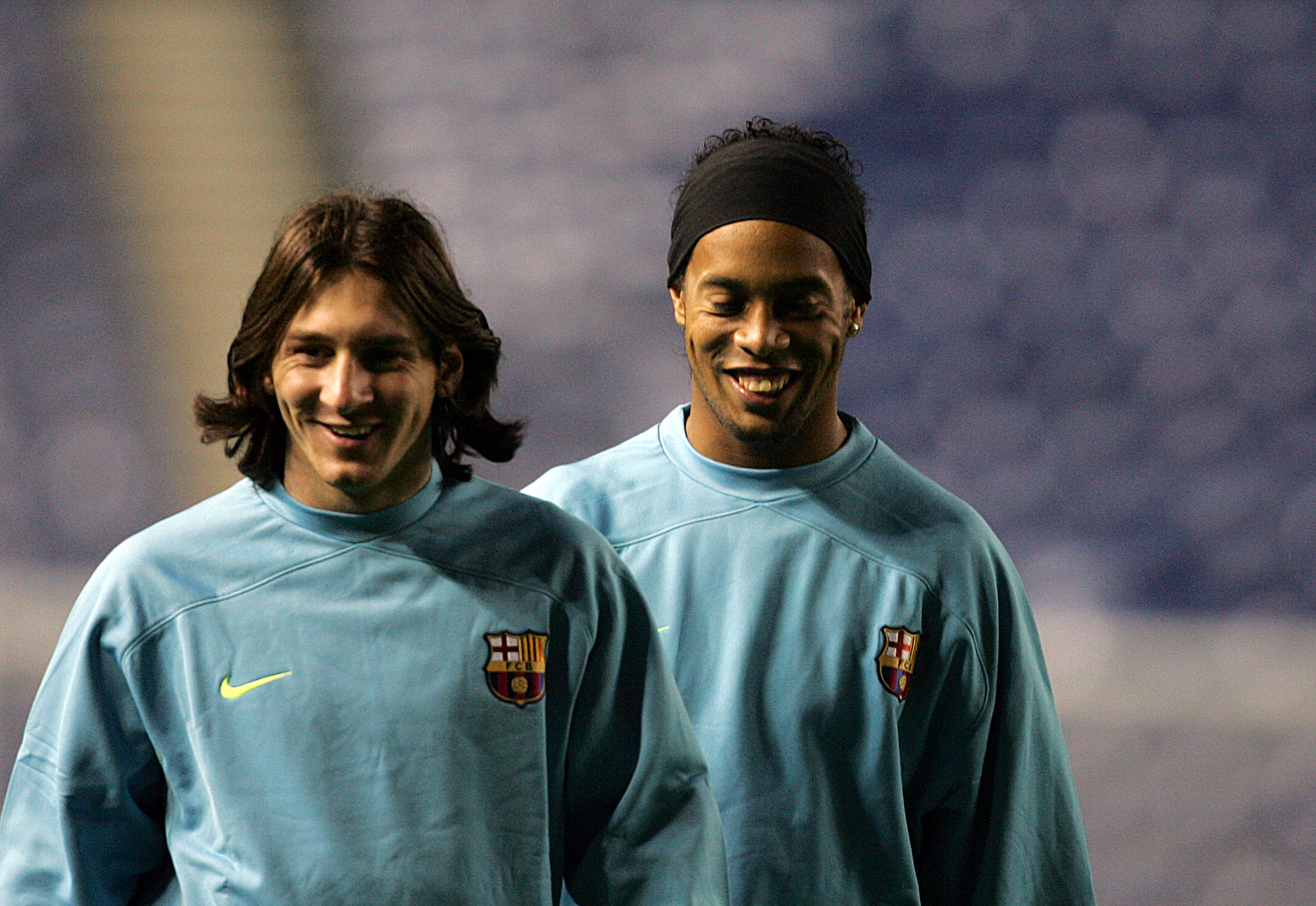 Messi and Ronaldinho while at Barca (©Ian MacNicol/Getty Images)