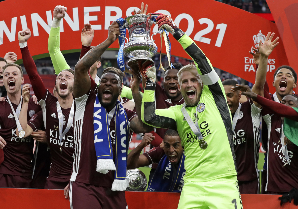 Morgan and Schmeichel list the FA Cup together (©AFP)