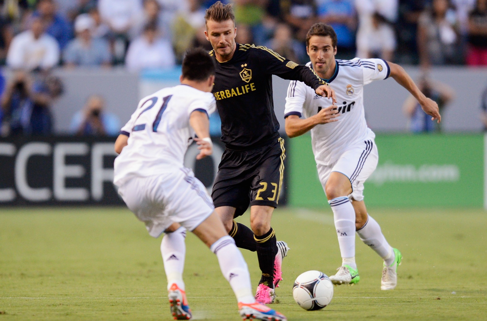 Once rivals, now on a same team: Beckham and Higuain (Kevork Djansezian/Getty Images)