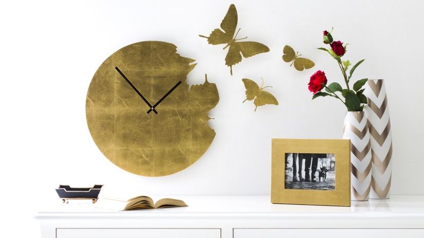 Pendule design avec papillons