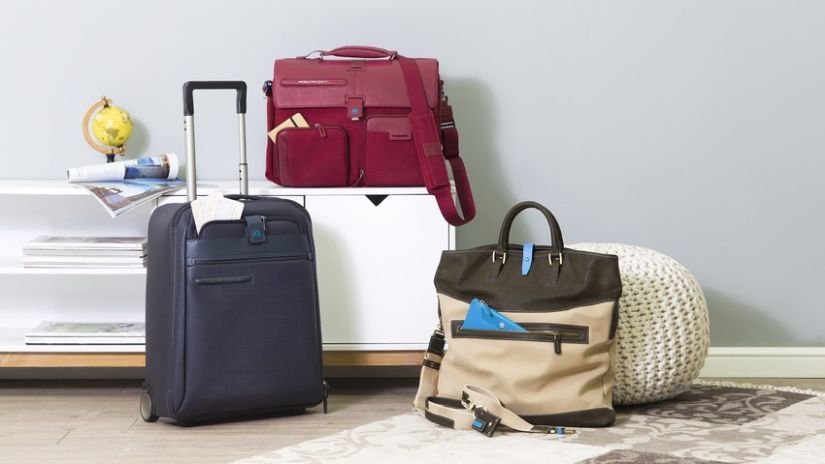 Valise bleu marine à roulettes