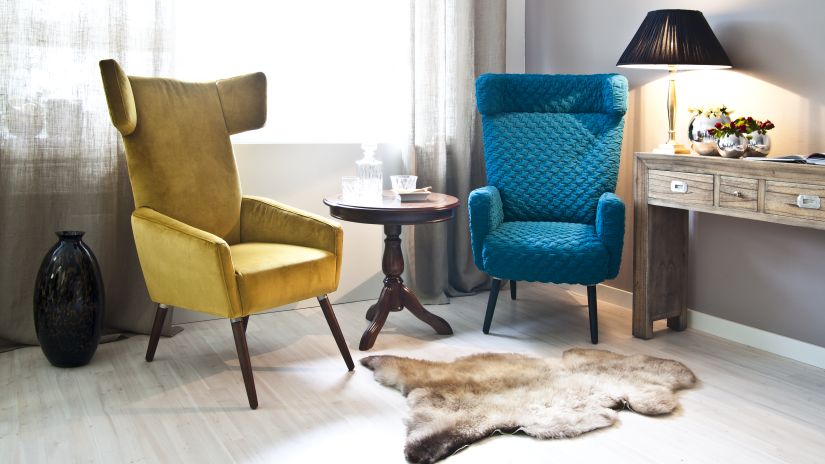 Fauteuil pétrole capitonné