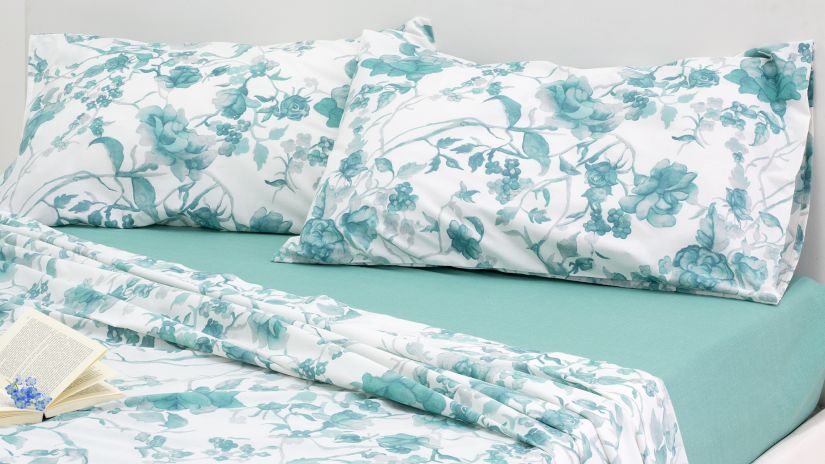 Housse de couette fleurie de couleur turqoise