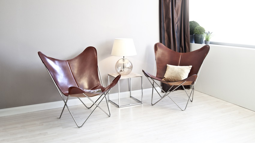 design fauteuils koeienhuid met kussens