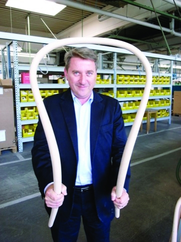 Designer James Irvine with the back and legs of the Thonet bentwood chair