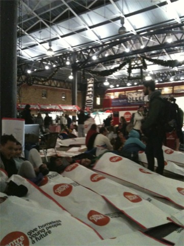 Centrepoint's supporter tuck into their cardboard sleeping bags