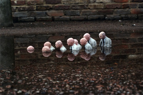 Follow the leader by Isaac Cordal