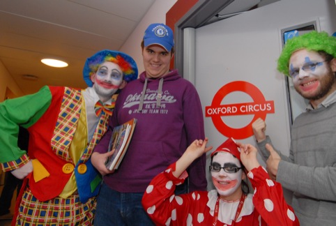 Orchard Hill College lecturers and student Luke Green celebrate their new Oxford Circus classroom