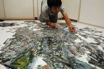 Sohei Nishino creating the maps