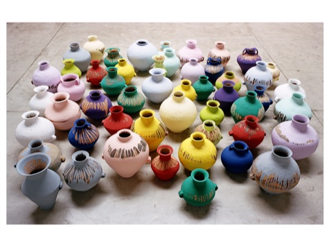 Ai Weiwei, Colored Vases, 2006. Neolithic vases (5000-3000 BC) and industrial paint, 51 pieces, dimensions variable. Courtesy the artist 