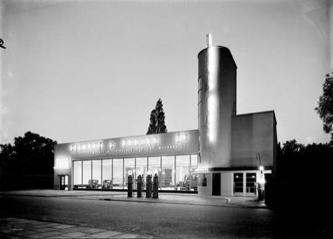 Henly's car showroom and service station, Great West Road, Brentford, London: close-up of the petrol pump forecourt