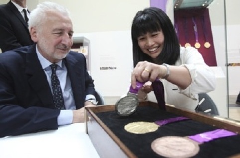 John Sorrell and Lin Cheung with the Paralympic medals