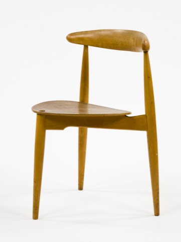 Three legged chair designed by Hans Wegner in 1949 and manufactured by Fritz Hansen in Denmark in c1960