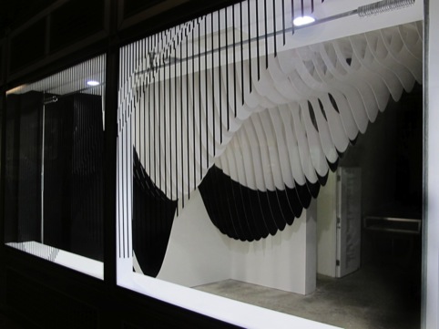 Zaha Hadid's Aqua installation for the Dover Street Market window