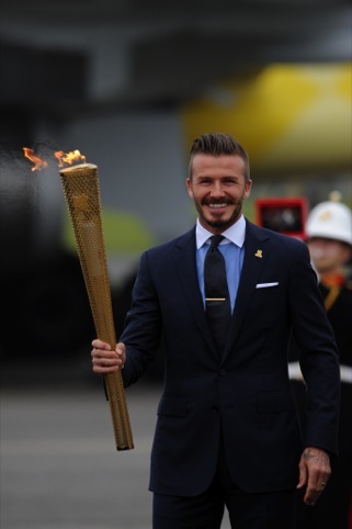  David Beckham with the torch during the ceremony to mark the arrival of the Olympic flame, at RNAS Culdrose, Cornwall.