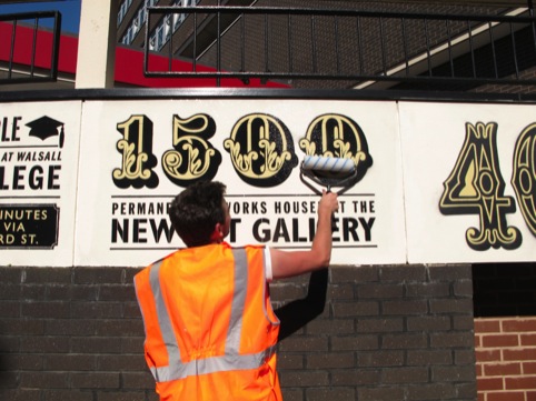 Installing the mural