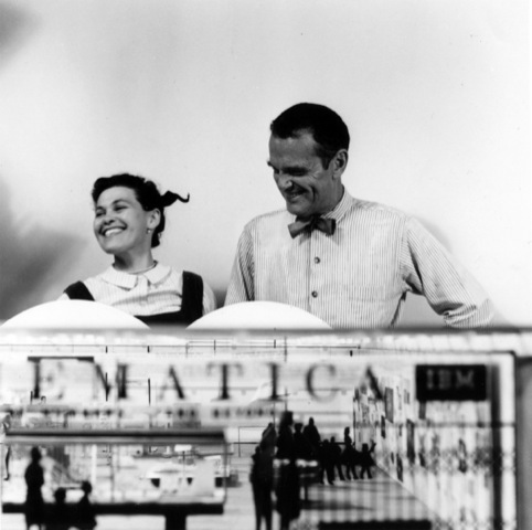 Ray and Charles Eames with a model of the exhibition Mathematica