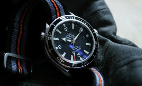 An Omega Seamaster watch (grappling hook not featured)