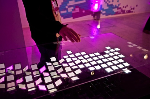 A festival-goer tries out the Jason Bruges Studio installation at the Internet Week Europe HQ at last year's festival