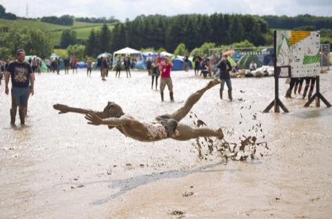 Sally Rose McCormack – Man diving into mud…, winner of Festivals category