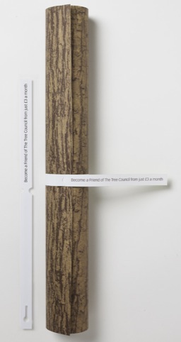 Rolled-up poster with tree tag.