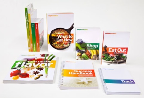 The new brand applied to print