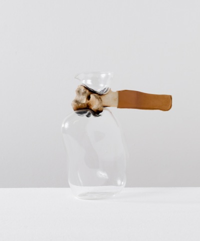 Bone Jar: Mouth blown glass on a cow bone, cow leather. 