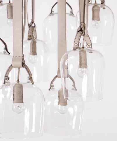 Bells-lights: Discarded Fendi leather, glass, leather-covered hooks, leather-covered electric wire.
