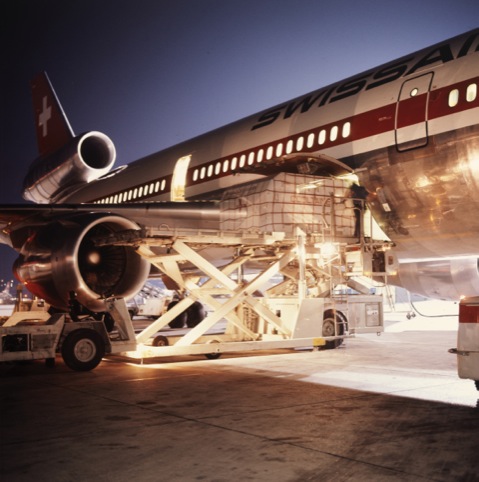 Loading cargo into a DC-10, 1980