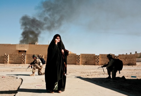 An Iraqi woman caught up in fighting between insurgents and Coalition troops, Ubaydi, 2005