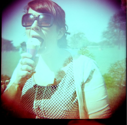 A lady mid ice-cream, shot with a Diana2 camera