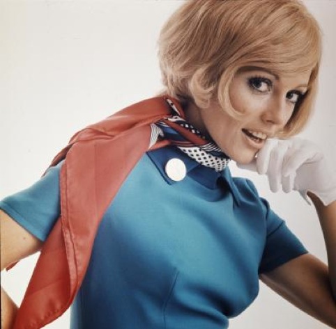 A model wearing the Swissair hostess1960 - 1970 uniforms